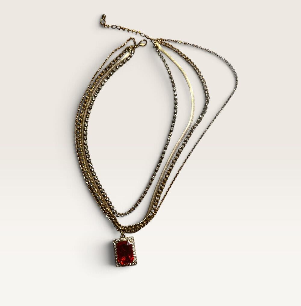Layered Gold-Tone Multi-Strand Necklace with Red Rhinestone Pendant